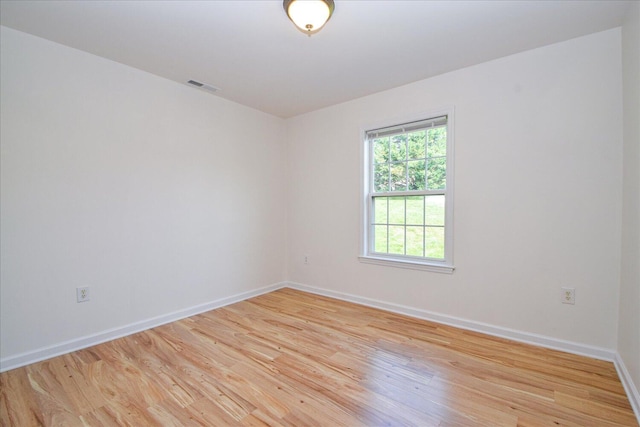 1903 Archbold Ave NE, Roanoke, VA 24012 - unfurnished room featuring light wood finished floors and baseboards