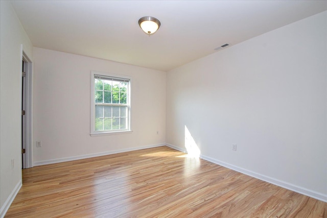 1903 Archbold Ave NE, Roanoke, VA 24012 - empty room with light wood-style flooring and baseboards
