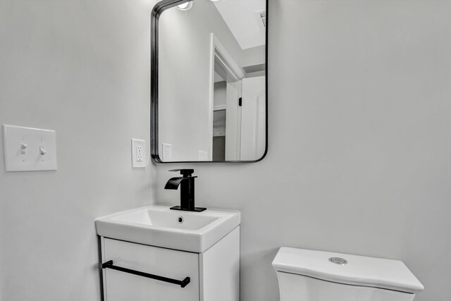 702 Commerce Ave, Iron Gate, VA 24448 - half bath with vanity and toilet