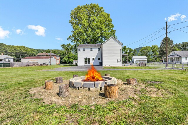 702 Commerce Ave, Iron Gate, VA 24448 - view of yard featuring a fire pit