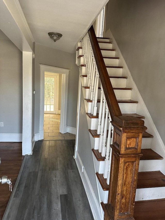 605 6th St SE, Roanoke, VA 24013 - staircase with baseboards and wood finished floors
