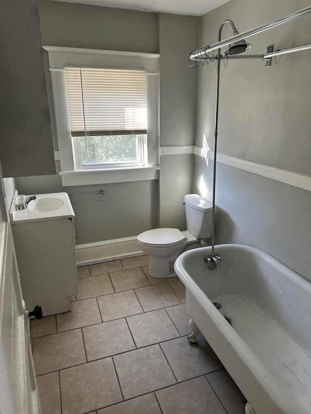 605 6th St SE, Roanoke, VA 24013 - bathroom with toilet, vanity, tile patterned floors, and bathing tub / shower combination
