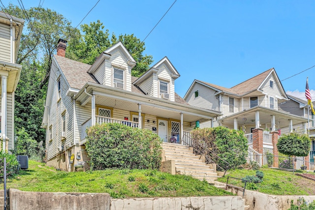 605 6th St SE, Roanoke, VA 24013 - view of front of property with a porch, stairway, a chimney, central AC unit, and a shingled roof