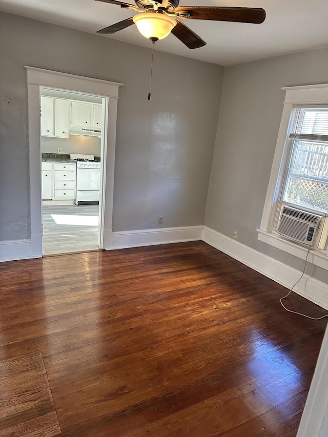 605 6th St SE, Roanoke, VA 24013 - empty room with ceiling fan, baseboards, dark wood finished floors, and cooling unit