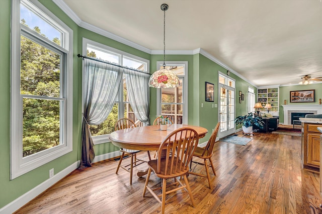 6355 Juliet Ct, Roanoke, VA 24018 - dining room featuring ornamental molding, baseboards, plenty of natural light, and dark wood-style flooring