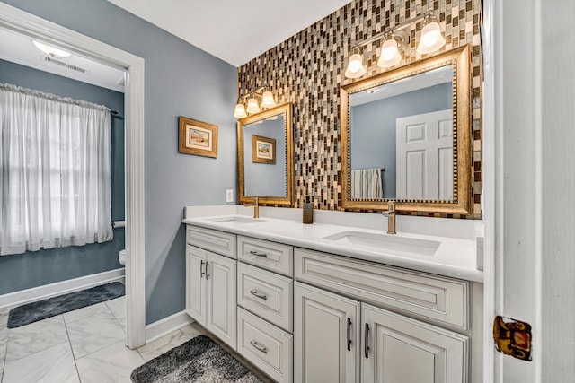 6355 Juliet Ct, Roanoke, VA 24018 - full bath with toilet, double vanity, marble look tile flooring, and baseboards