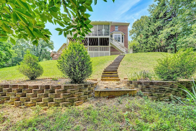 6355 Juliet Ct, Roanoke, VA 24018 - rear view of house with a sunroom, stairs, a yard, and brick siding