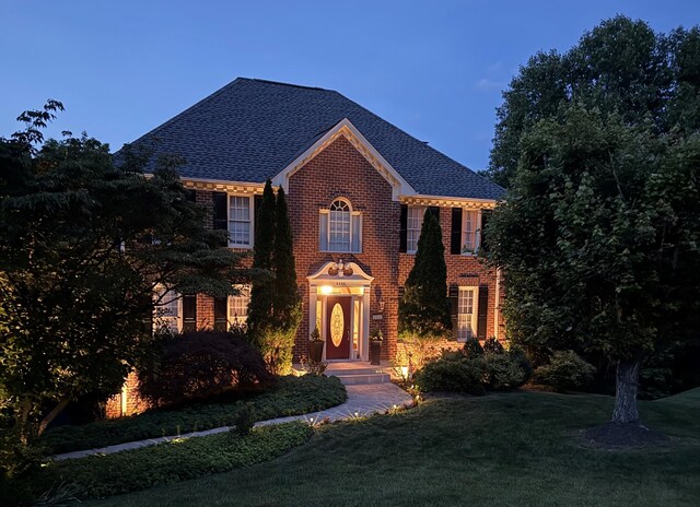 6355 Juliet Ct, Roanoke, VA 24018 - colonial home with a front lawn, a shingled roof, and brick siding