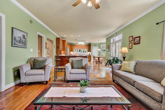6355 Juliet Ct, Roanoke, VA 24018 - living room with crown molding, light wood-style flooring, a ceiling fan, baseboards, and recessed lighting
