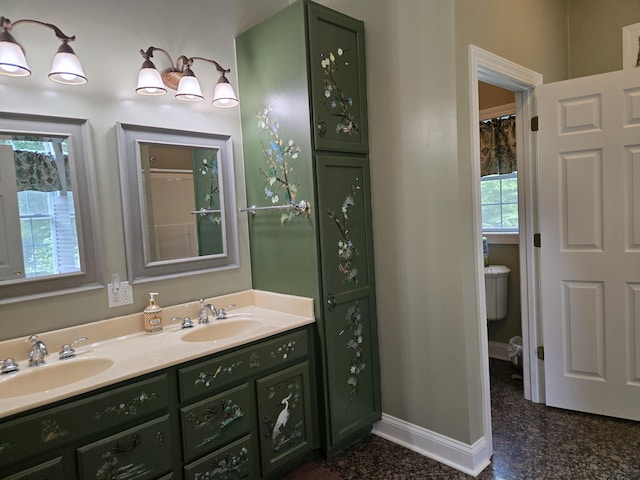 6733 Floyd Hwy S, Willis, VA 24380 - full bath with toilet, double vanity, healthy amount of natural light, and granite tiled floors