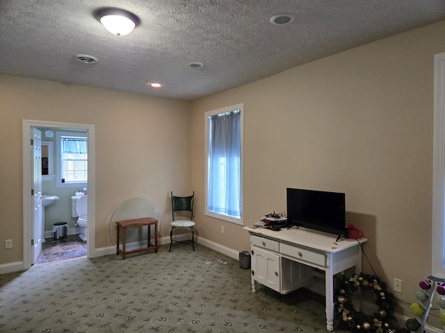6733 Floyd Hwy S, Willis, VA 24380 - carpeted home office with baseboards and a textured ceiling