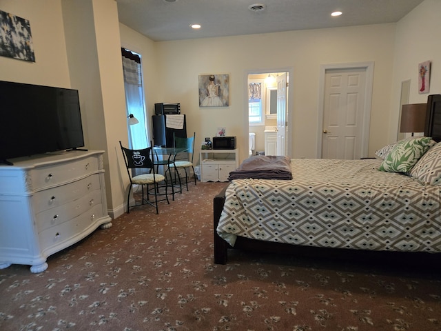 6733 Floyd Hwy S, Willis, VA 24380 - carpeted bedroom with recessed lighting and baseboards