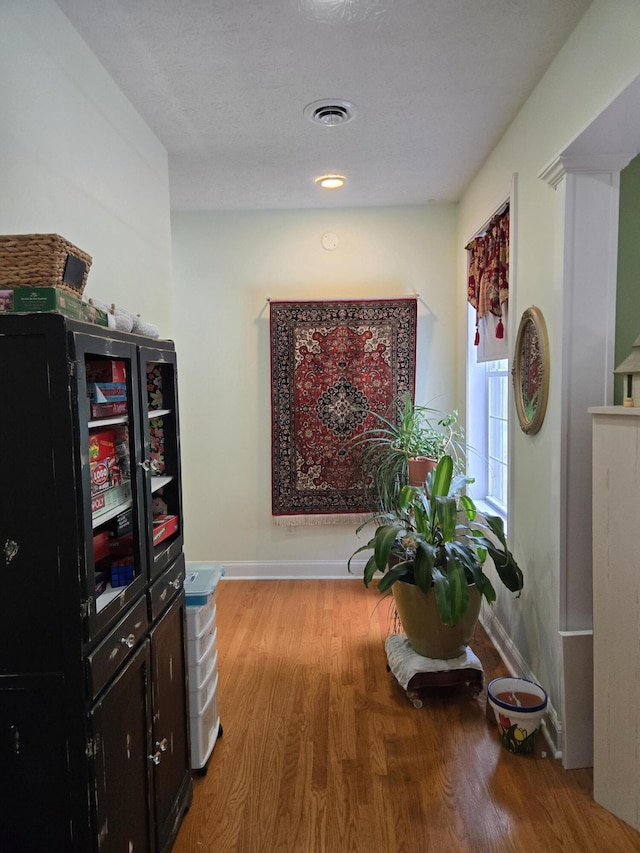 6733 Floyd Hwy S, Willis, VA 24380 - hallway featuring wood finished floors and baseboards