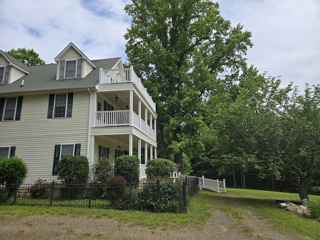6733 Floyd Hwy S, Willis, VA 24380 - view of side of property with a balcony, driveway, and roof with shingles