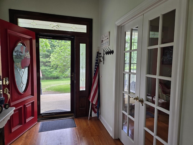 6733 Floyd Hwy S, Willis, VA 24380 - foyer entrance featuring french doors, wood finished floors, plenty of natural light, and baseboards