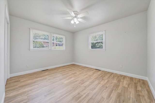 3271 Rasmont Rd, Roanoke, VA 24018 - spare room with healthy amount of natural light, light wood-style flooring, baseboards, and a ceiling fan