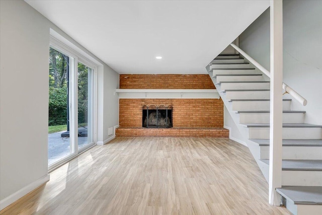 3271 Rasmont Rd, Roanoke, VA 24018 - unfurnished living room featuring stairway, baseboards, wood finished floors, and recessed lighting