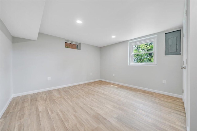 3271 Rasmont Rd, Roanoke, VA 24018 - spare room featuring electric panel, light wood-style flooring, baseboards, and recessed lighting