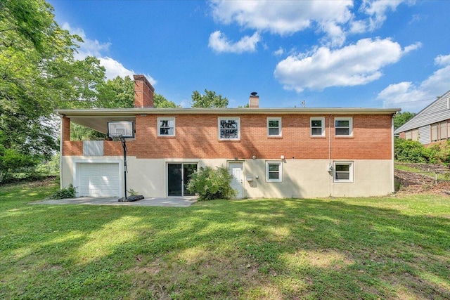 3271 Rasmont Rd, Roanoke, VA 24018 - rear view of property featuring a chimney, a lawn, a garage, and brick siding