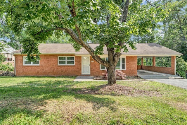 3271 Rasmont Rd, Roanoke, VA 24018 - ranch-style house with driveway, an attached carport, brick siding, and a front lawn