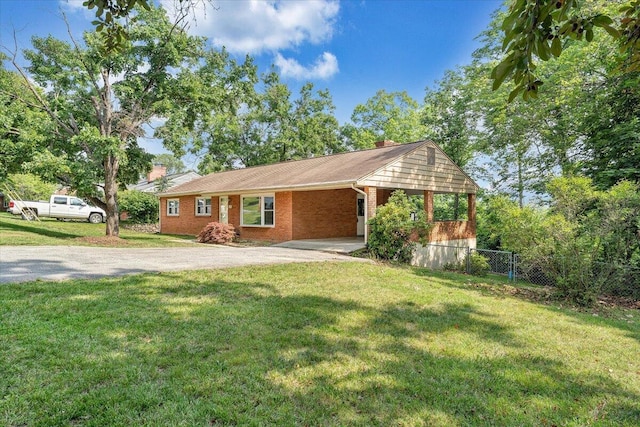 3271 Rasmont Rd, Roanoke, VA 24018 - ranch-style home with a chimney, asphalt driveway, brick siding, and a carport
