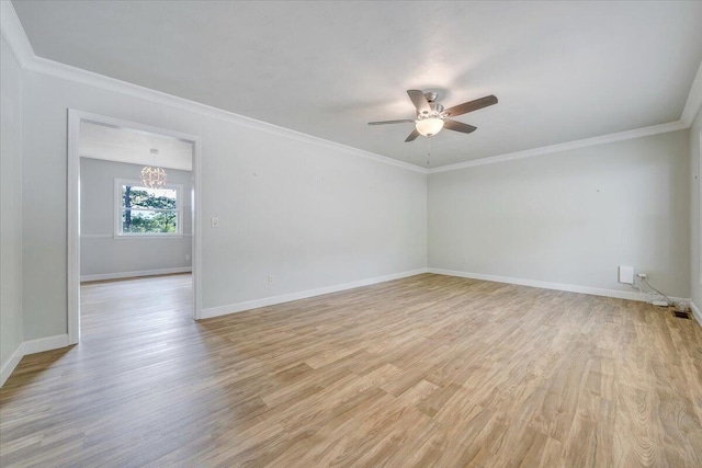 3271 Rasmont Rd, Roanoke, VA 24018 - spare room featuring light wood-style floors, a chandelier, a ceiling fan, baseboards, and ornamental molding