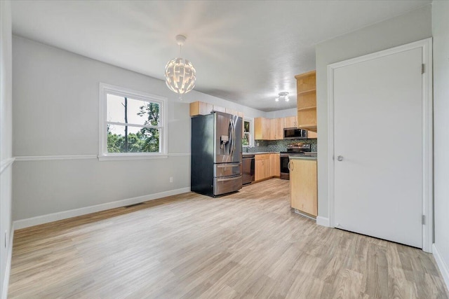 3271 Rasmont Rd, Roanoke, VA 24018 - kitchen with stainless steel appliances, a chandelier, light brown cabinets, and baseboards