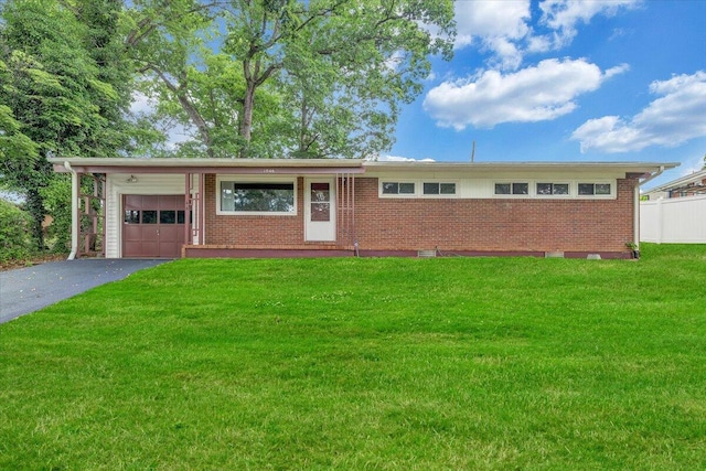 1046 Silverwood Rd NW, Roanoke, VA 24017 - ranch-style house with a garage, driveway, and brick siding