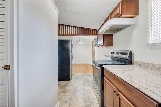 1046 Silverwood Rd NW, Roanoke, VA 24017 - kitchen featuring appliances with stainless steel finishes, range hood, brown cabinetry, stone finish flooring, and a textured ceiling