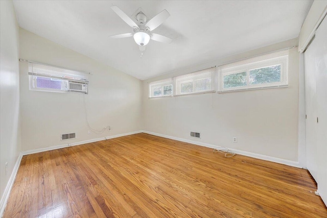 1046 Silverwood Rd NW, Roanoke, VA 24017 - unfurnished room with light wood finished floors, plenty of natural light, vaulted ceiling, and a ceiling fan