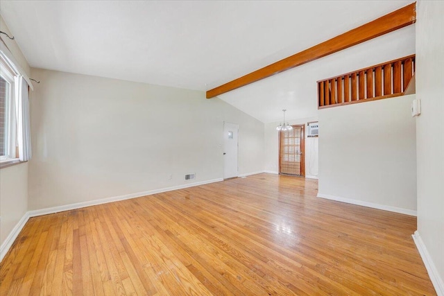 1046 Silverwood Rd NW, Roanoke, VA 24017 - empty room featuring light wood-style flooring, a chandelier, and plenty of natural light