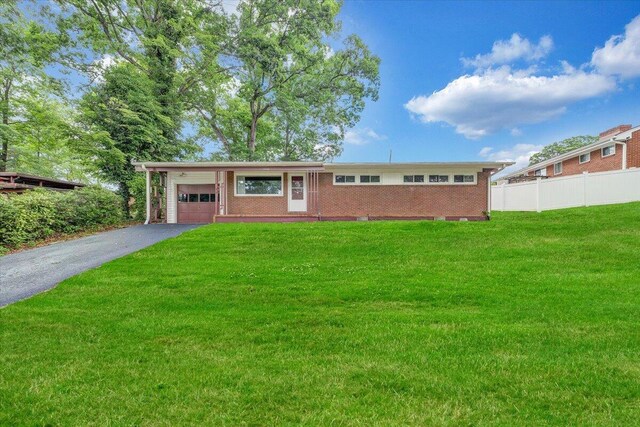1046 Silverwood Rd NW, Roanoke, VA 24017 - ranch-style house with asphalt driveway, brick siding, and an attached garage