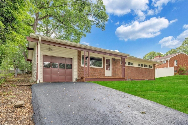 1046 Silverwood Rd NW, Roanoke, VA 24017 - single story home featuring a garage, asphalt driveway, and brick siding