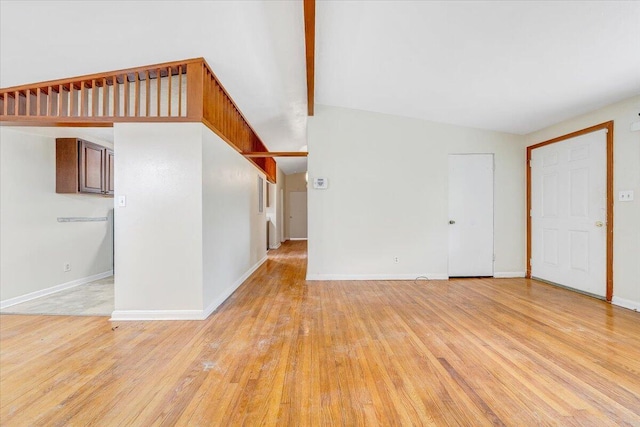 1046 Silverwood Rd NW, Roanoke, VA 24017 - unfurnished living room featuring light wood-style floors and baseboards