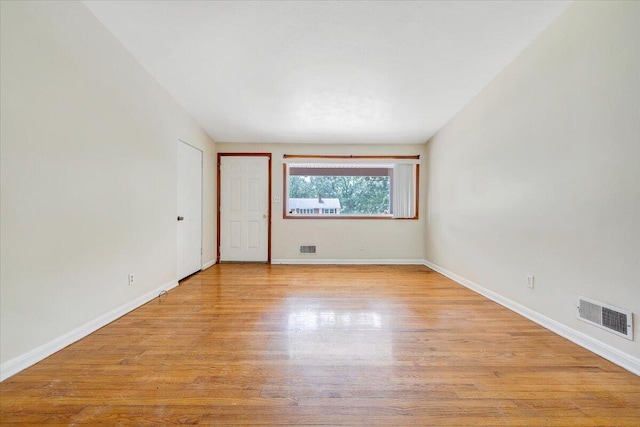 1046 Silverwood Rd NW, Roanoke, VA 24017 - unfurnished room with light wood-style floors and baseboards