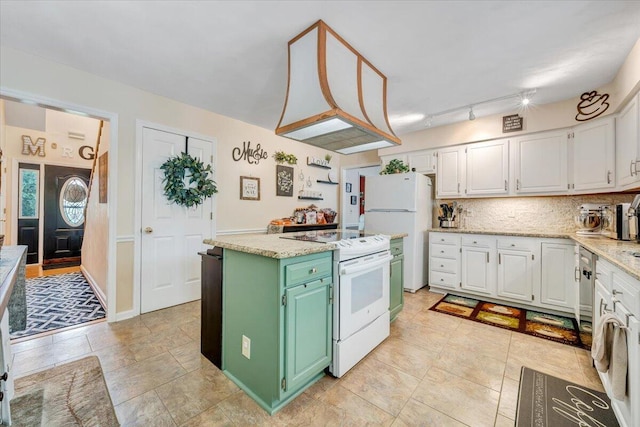 201 Jay Ridge Rd, Cloverdale, VA 24077 - kitchen featuring white appliances, white cabinets, a center island, tasteful backsplash, and light stone countertops