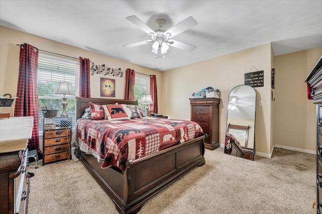 201 Jay Ridge Rd, Cloverdale, VA 24077 - bedroom with light colored carpet, ceiling fan, and baseboards