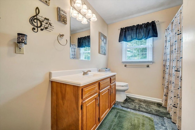 201 Jay Ridge Rd, Cloverdale, VA 24077 - bathroom with vanity, toilet, baseboards, and a shower with shower curtain
