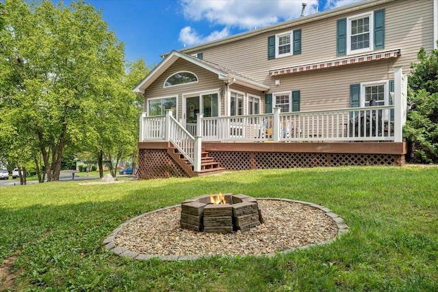 201 Jay Ridge Rd, Cloverdale, VA 24077 - rear view of house featuring a wooden deck, a fire pit, a lawn, and stairway