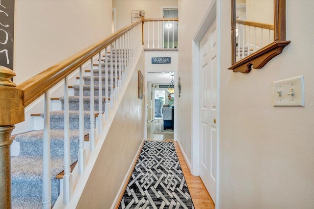 201 Jay Ridge Rd, Cloverdale, VA 24077 - staircase featuring a high ceiling and baseboards