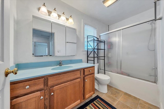 825 Day Ave SW, Roanoke, VA 24016 - full bathroom featuring vanity, toilet, and bath / shower combo with glass door