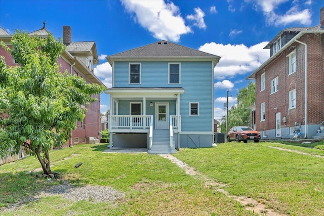 825 Day Ave SW, Roanoke, VA 24016 - view of front of house featuring covered porch, cooling unit, and a front lawn