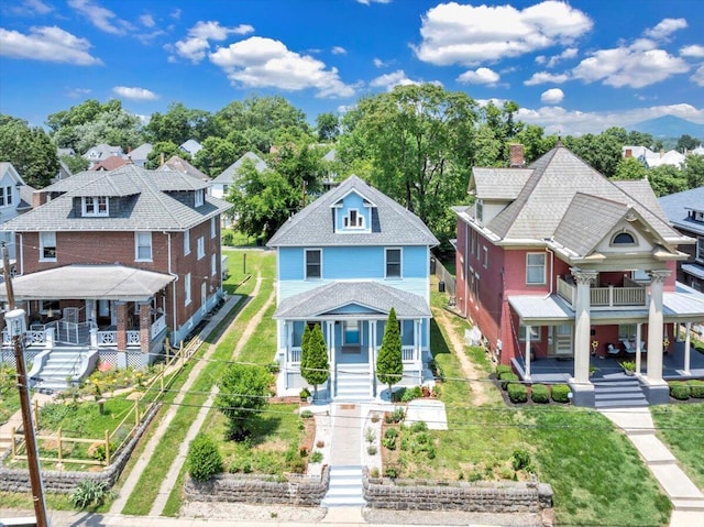 825 Day Ave SW, Roanoke, VA 24016 - traditional style home featuring covered porch, stairs, a front yard, and a garden