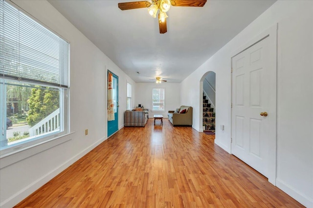 825 Day Ave SW, Roanoke, VA 24016 - entryway with a ceiling fan, arched walkways, light wood-style floors, and baseboards