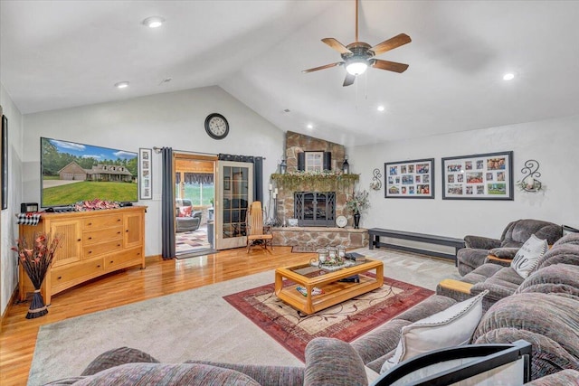 5335 Catawba Valley Dr, Catawba, VA 24070 - living area featuring vaulted ceiling, wood finished floors, a ceiling fan, a fireplace, and recessed lighting