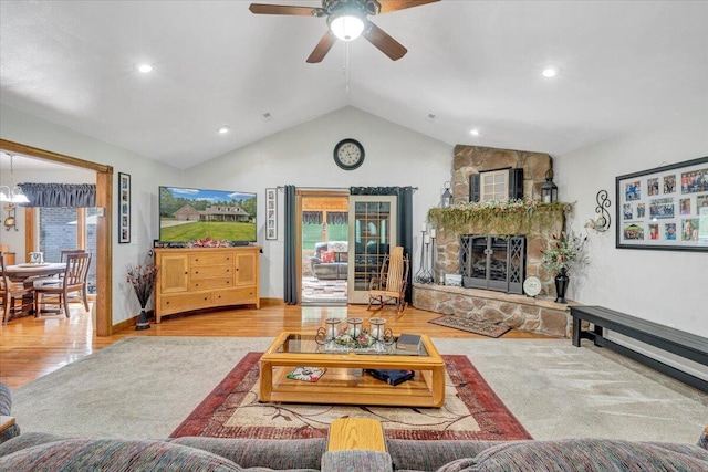 5335 Catawba Valley Dr, Catawba, VA 24070 - living area with vaulted ceiling, a ceiling fan, a stone fireplace, wood finished floors, and recessed lighting