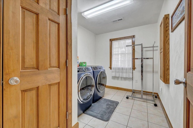 5335 Catawba Valley Dr, Catawba, VA 24070 - washroom with independent washer and dryer and light tile patterned floors