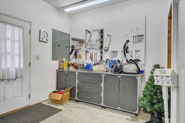 5335 Catawba Valley Dr, Catawba, VA 24070 - misc room with electric panel, unfinished concrete floors, and a workshop area
