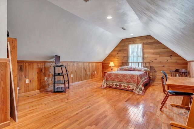 5335 Catawba Valley Dr, Catawba, VA 24070 - bedroom with wood walls, wood-type flooring, and vaulted ceiling
