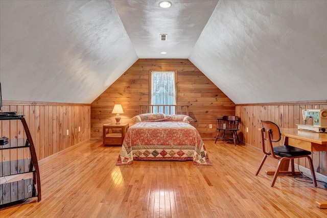 5335 Catawba Valley Dr, Catawba, VA 24070 - bedroom with hardwood / wood-style floors, wood walls, and vaulted ceiling